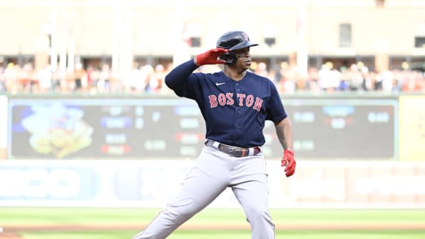 Sep 10, 2022; Baltimore, Maryland, USA; Boston Red Sox third baseman Rafael Devers (11) gestures rounding the bases after hitting a grand slam home run during the first inning against the Baltimore Orioles at Oriole Park at Camden Yards. Mandatory Credit: James A. Pittman-USA TODAY Sports